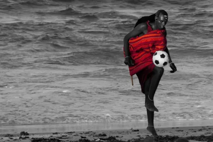 Framed Print : Msai Tribesman - rests playing football after Framed Print : Msai Tribesman - rests playing football after