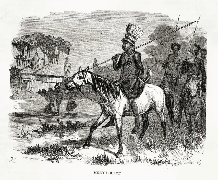 Framed Print : A Musgu chief rides his horse on the outskirts of a village Framed Print : A Musgu chief rides his horse on the outskirts of a village