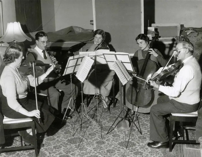 Framed Print : A musical quintet rehearse a piece of classical music. Date: 1930s Framed Print : A musical quintet rehearse a piece of classical music. Date: 1930s