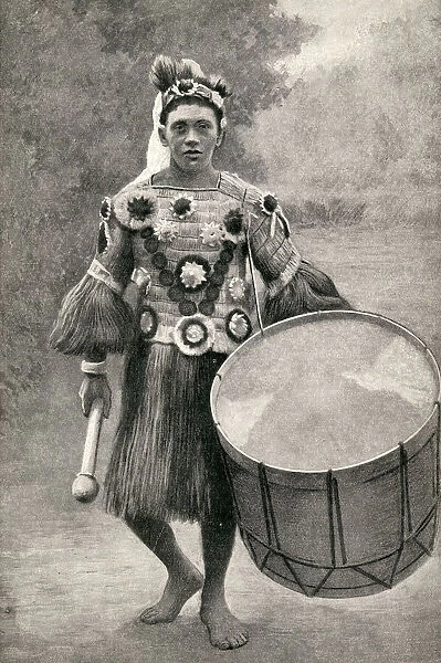 Musician with large drum, Tahiti, French Polynesia