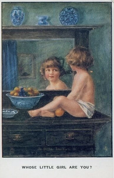 Naked little girl looking in the mirror