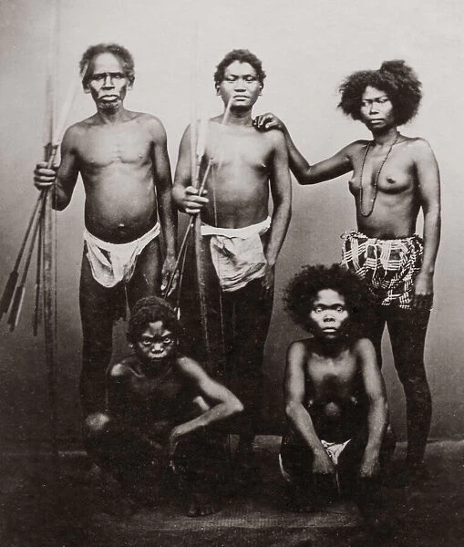 Native tribal group with weapons, probably Philippines