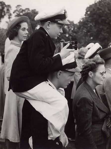 Naval cadet in a group of spectators