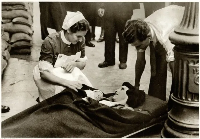 Framed Print : New mother evacuated from hospital 1939 Framed Print : New mother evacuated from hospital 1939