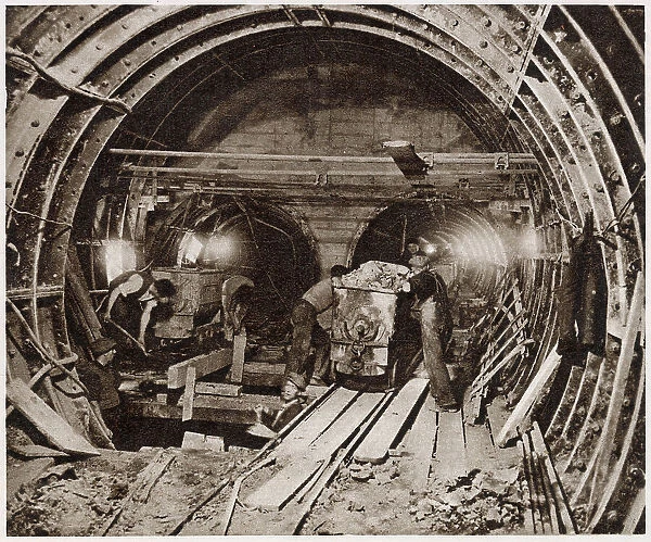 New tunnels for the Post Office Railway. 70ft beneath the ground near Oxford Street the nearly completed, double track line, that carried mail between some of London's largest sorting offices and some of the main railway termini. Date: 1958