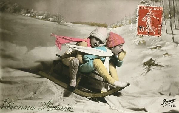 New Year card - two children on a sled