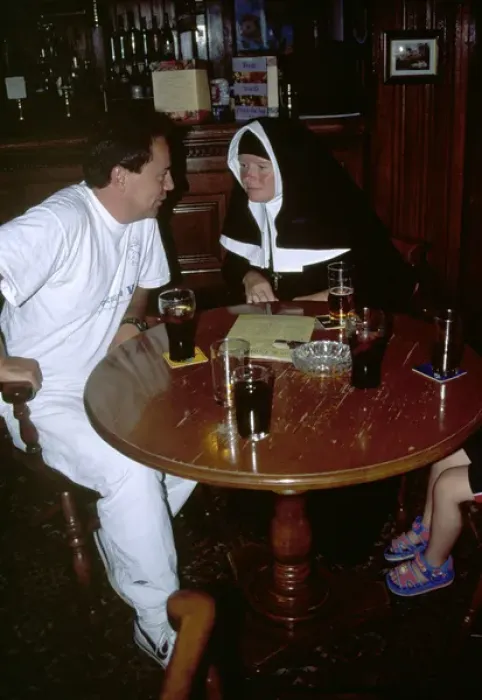 Framed Print : Nun with a man in a pub Framed Print : Nun with a man in a pub