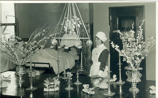 Nurse with Christmas decorations and flowers