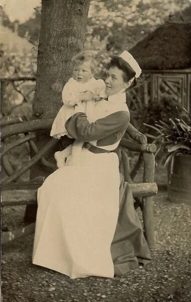 Nurse holding an infant