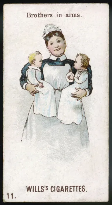Framed Print : NURSE HOLDS TWINS Framed Print : NURSE HOLDS TWINS