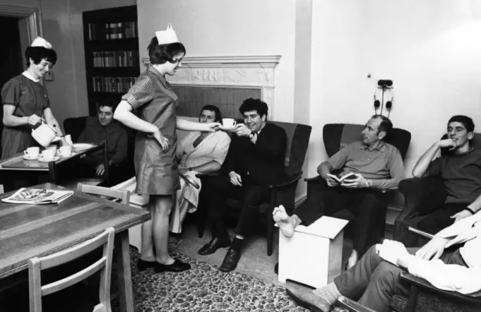 Framed Print : Two nurses with convalescing policemen Framed Print : Two nurses with convalescing policemen