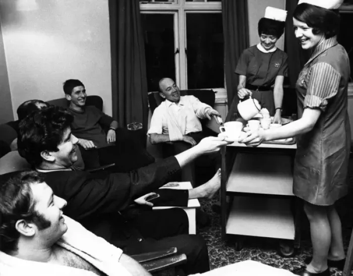 Framed Print : Two nurses with convalescing policemen Framed Print : Two nurses with convalescing policemen
