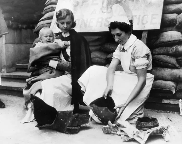 Framed Print : Nurses from Great Ormond Street Hospital examine bomb Framed Print : Nurses from Great Ormond Street Hospital examine bomb