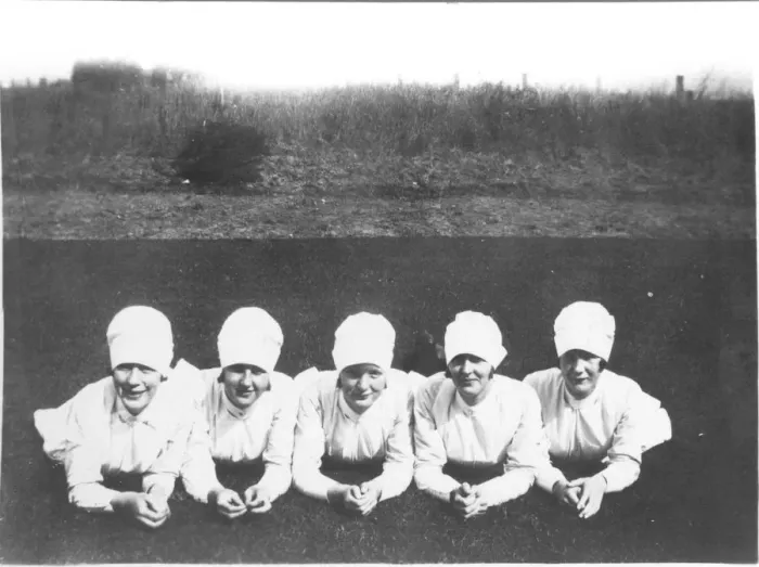 Framed Print : Five nurses outdoors