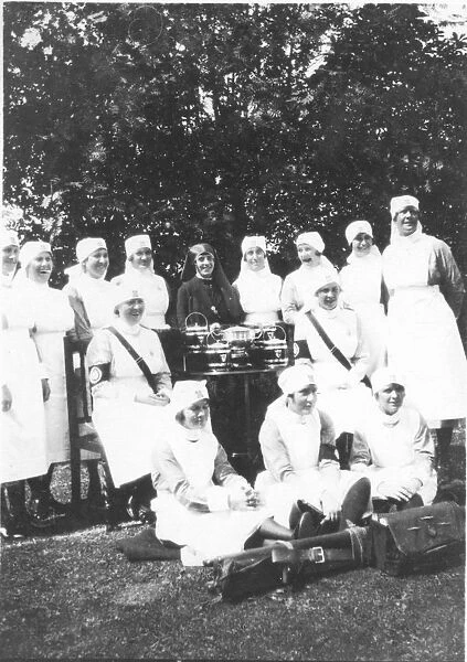 Nurses outdoors (one with brassard)