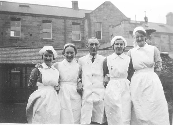 Four nurses and possible male nurse ordoctor