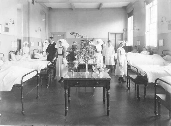 Nurses and staff in female ward