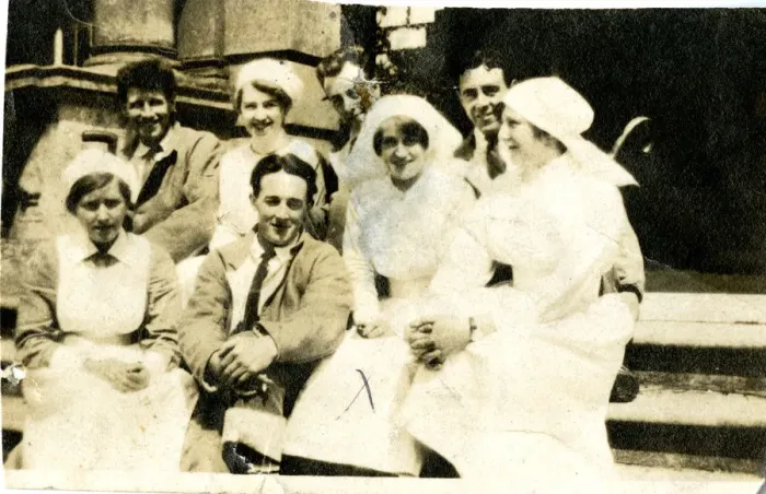 Framed Print : Four nurses and wounded servicemen on steps Framed Print : Four nurses and wounded servicemen on steps