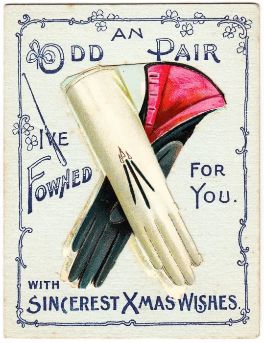 Framed Print : Odd pair of gloves with comic greeting on a Christmas card Framed Print : Odd pair of gloves with comic greeting on a Christmas card