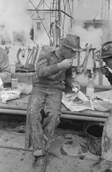 Oil worker eating lunch. Kilgore, Texas