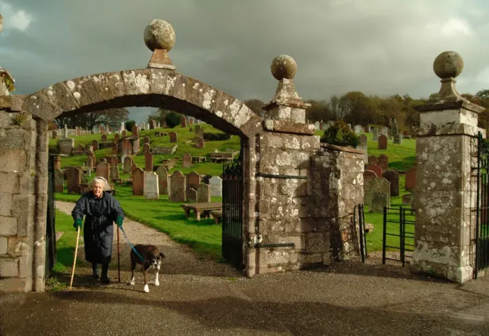 Framed Print : Old lady - 17th Century gateway to Kirkcudbright graveyard Framed Print : Old lady - 17th Century gateway to Kirkcudbright graveyard