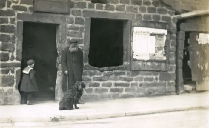 Framed Print : Old man and a dog on a street Framed Print : Old man and a dog on a street