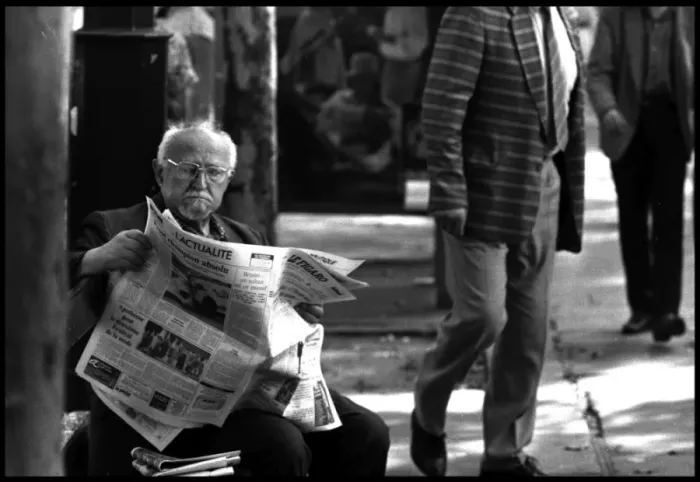 Framed Print : Old man in street, Paris with newspaper Framed Print : Old man in street, Paris with newspaper