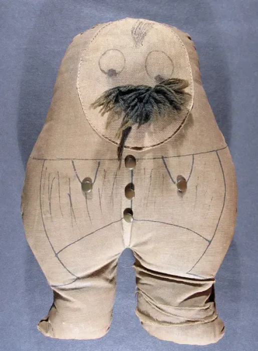 Framed Print : Ole Bill printed fabric doll with wood and button detail Framed Print : Ole Bill printed fabric doll with wood and button detail