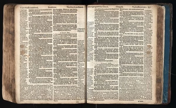 Opening from the Geneva Bible showing chapters 11-13 of the