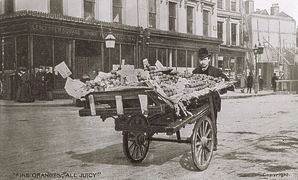 Orange Seller with his barrow - Leicester Square, London