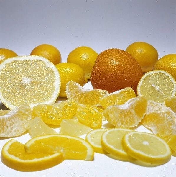 ORANGES. Segments and slices of fresh oranges, temptingly displayed. Date: 1979
