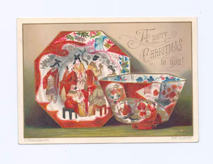 Framed Print : Oriental china plate and bowl on a Christmas postcard Framed Print : Oriental china plate and bowl on a Christmas postcard