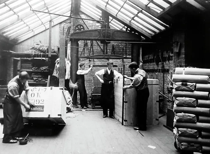 Framed Print : Packing finished cloth in a woollen mill in Bradford Framed Print : Packing finished cloth in a woollen mill in Bradford