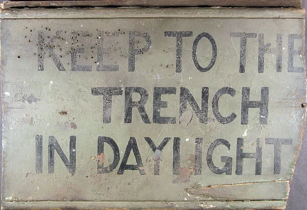 A painted wooden trench sign