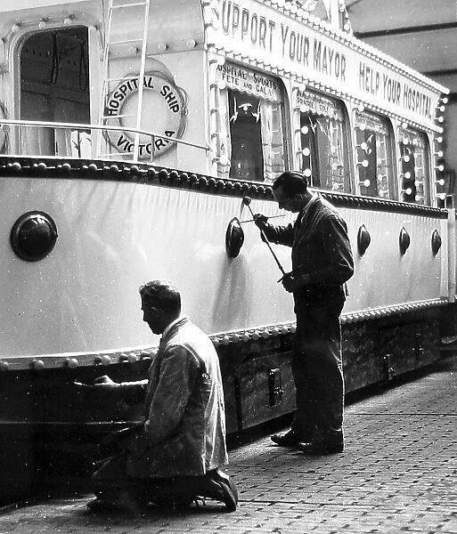 Painting a tram, Burnley