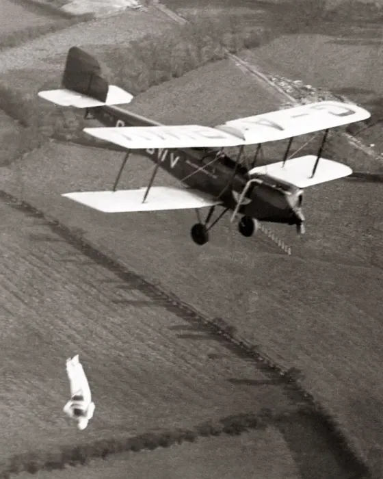 Framed Print : Parachuctisit jumps headfirst from biplane, Hayes, 1933 Framed Print : Parachuctisit jumps headfirst from biplane, Hayes, 1933