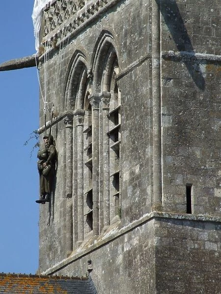 US Paratrooper hanging on Ste Mere Eglise church