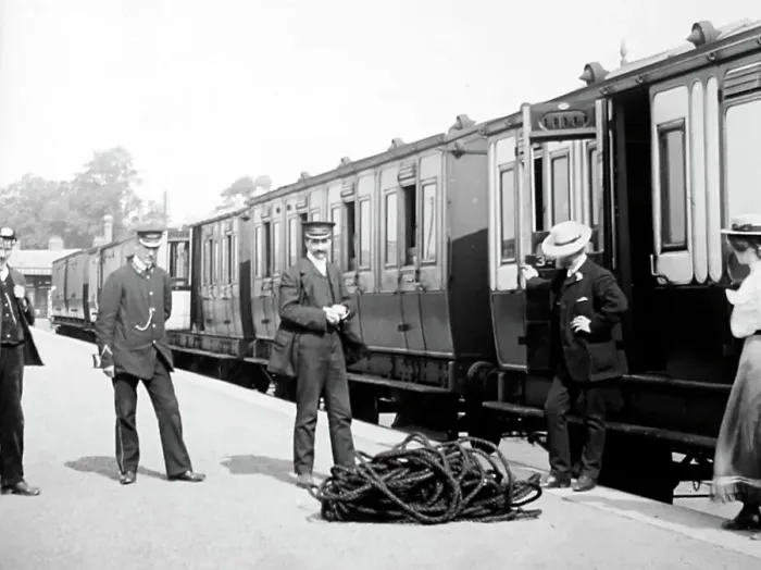Framed Print : Passengers and porters at an English railway station Framed Print : Passengers and porters at an English railway station