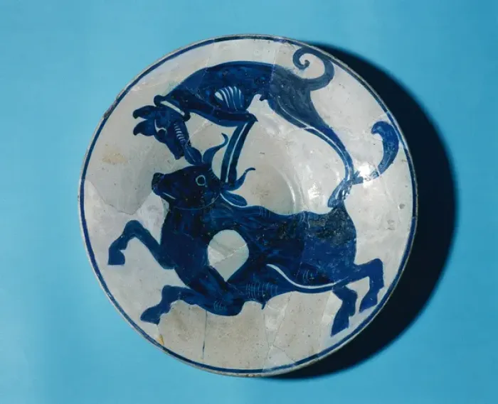 Framed Print : Paterna ceramic style. Blue plate. Dog attacking a bull. 15t Framed Print : Paterna ceramic style. Blue plate. Dog attacking a bull. 15t