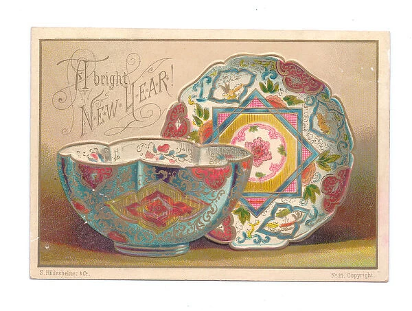 Patterned china plate and bowl on a New Year postcard