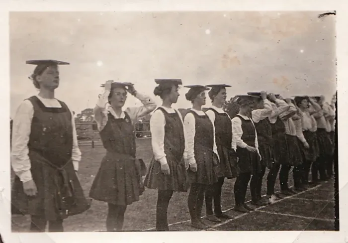 Framed Print : Peace day Sports. Line of students balancing books on heads Framed Print : Peace day Sports. Line of students balancing books on heads