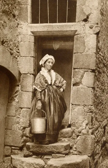 Framed Print : Peasant woman with pail, Auvergne, France Framed Print : Peasant woman with pail, Auvergne, France