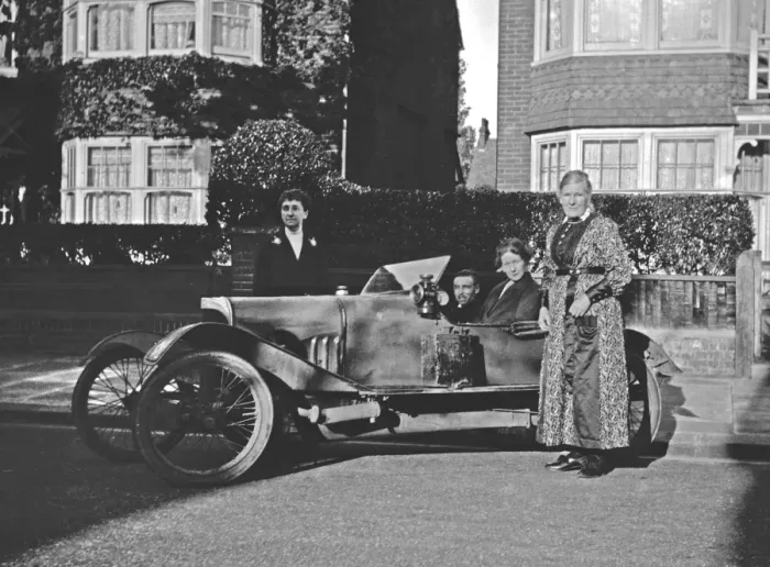 Framed Print : People with car in suburban street Framed Print : People with car in suburban street
