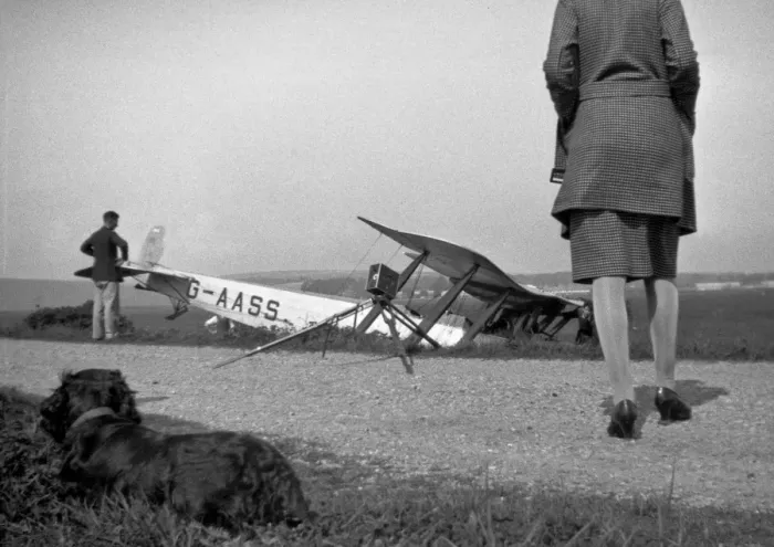 Framed Print : People and dog with crashed biplane Framed Print : People and dog with crashed biplane