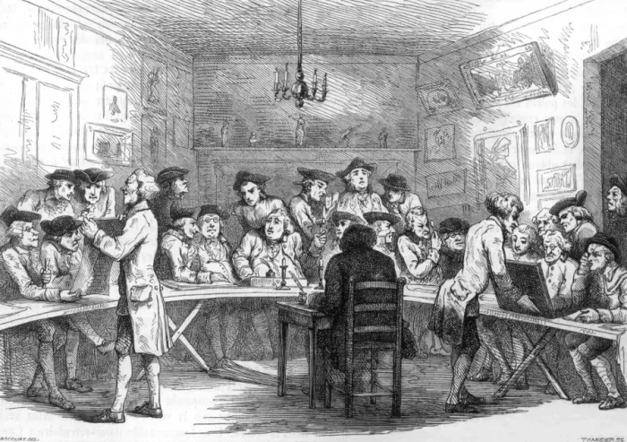Framed Print : People examining lots at an auction Framed Print : People examining lots at an auction
