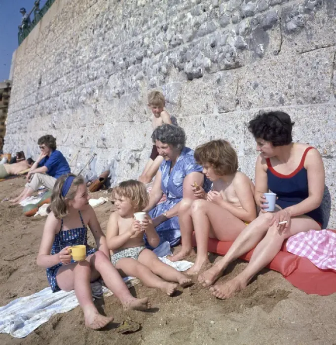 Framed Print : People having a drink on a sandy beach Framed Print : People having a drink on a sandy beach
