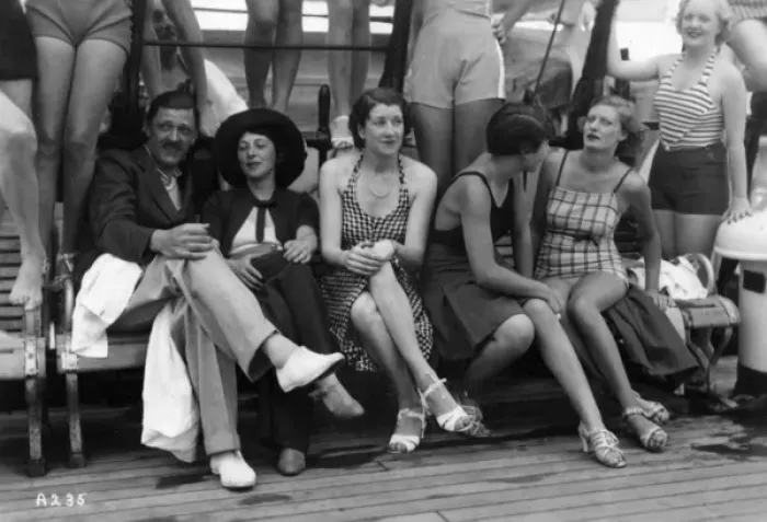 Framed Print : People in leisurewear and swimwear on board ship Framed Print : People in leisurewear and swimwear on board ship