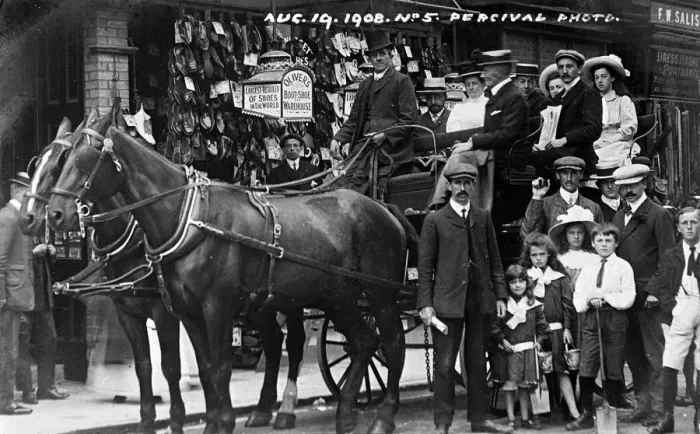 Framed Print : People outside Olivers Boot and Shoe Warehouse Framed Print : People outside Olivers Boot and Shoe Warehouse
