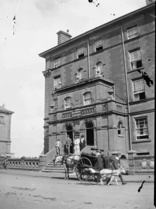 Framed Print : People outside a Pembrokeshire boarding house Framed Print : People outside a Pembrokeshire boarding house