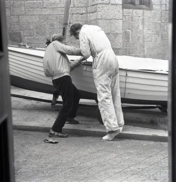 Framed Print : Two people preparing a sailing dinghy Framed Print : Two people preparing a sailing dinghy